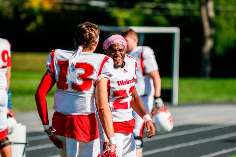 a group of football players on a field