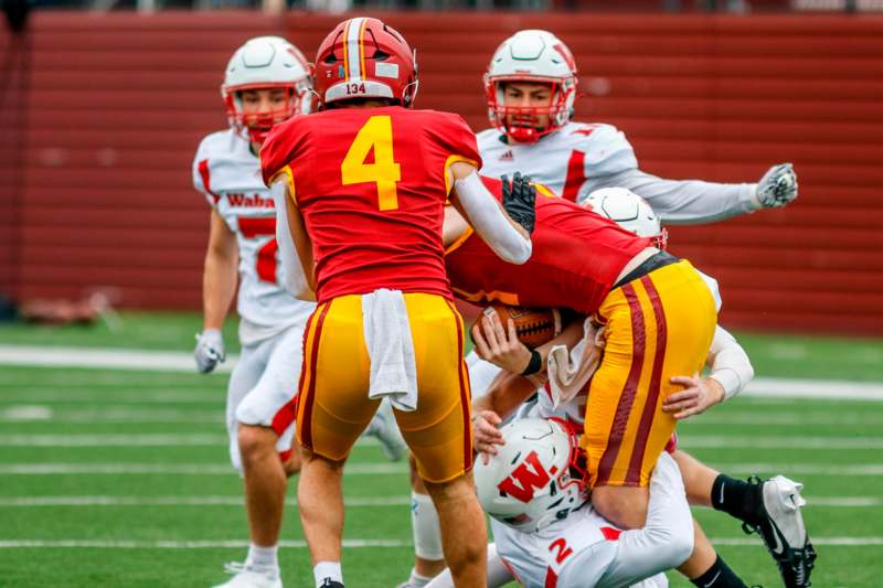 a group of people playing football