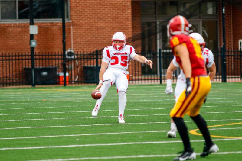 a football player in a uniform on a field