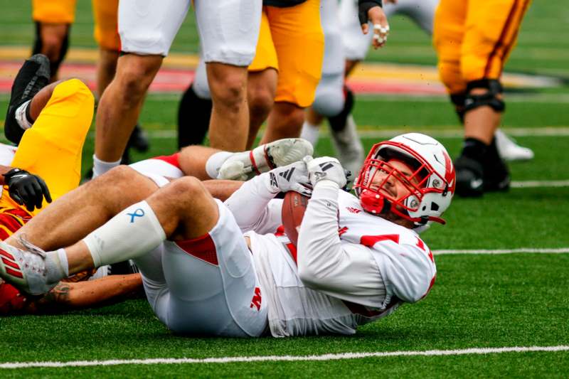 a football player lying on the ground