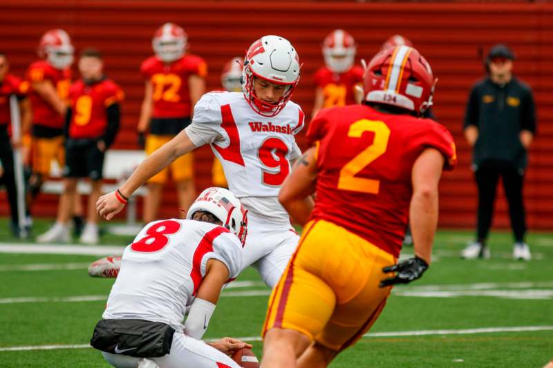 a football player in a red uniform