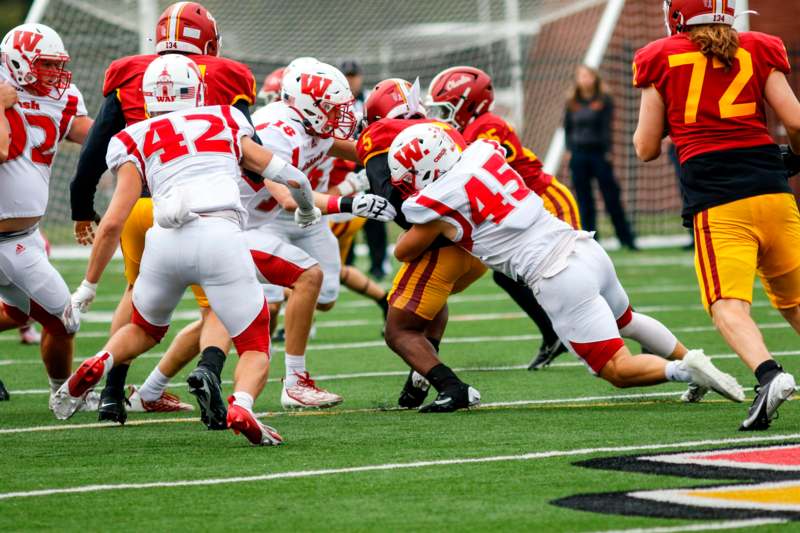 a group of football players on a field