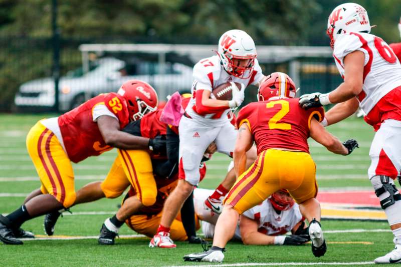 a group of football players on a field