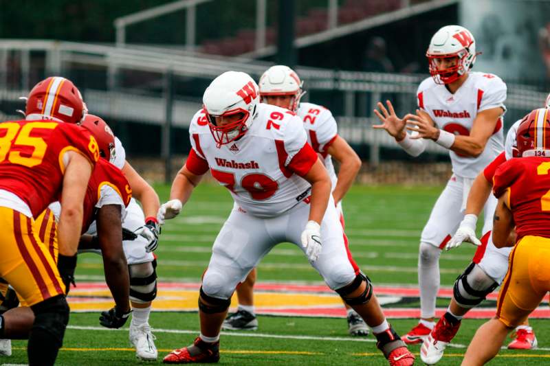 a group of football players on a field