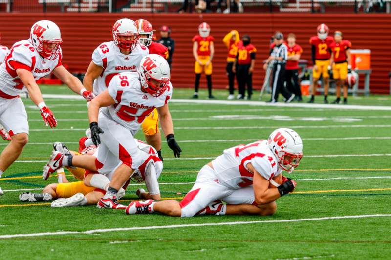 a group of football players on a field