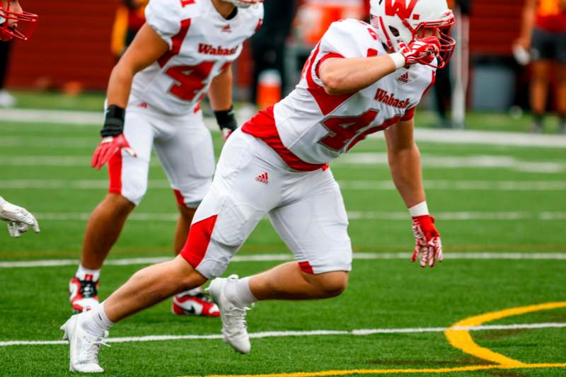 a football player running on a field