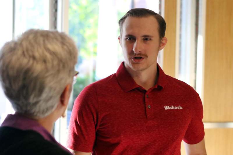 a man talking to a man