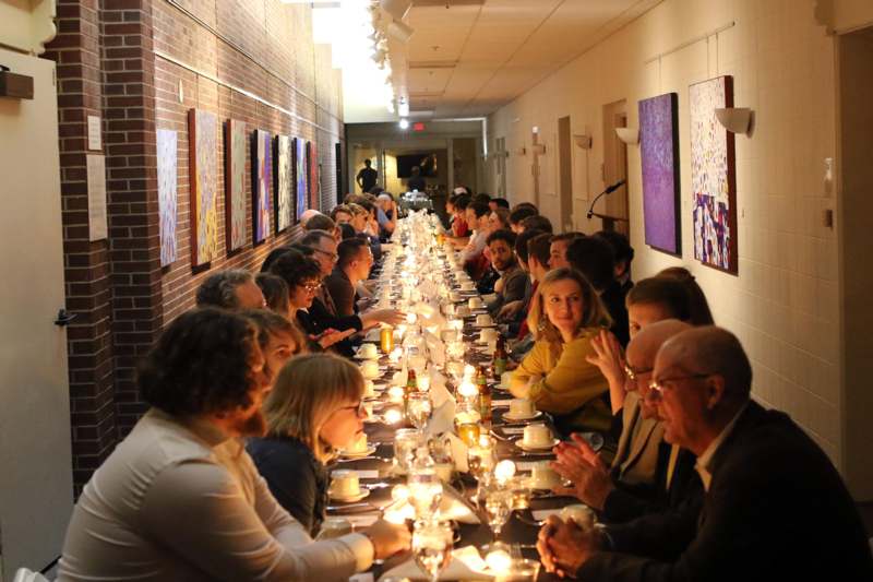 a long table with people sitting at it