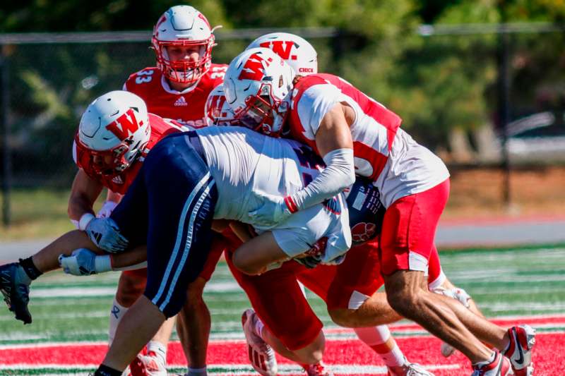 a group of football players on a field