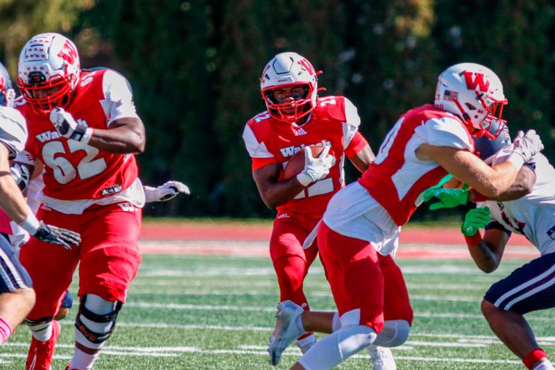 a group of football players on a field