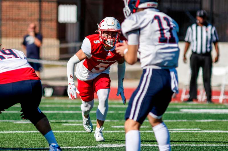 a football player running on a field