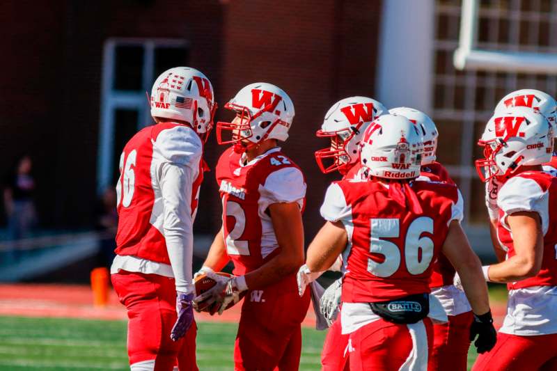 a group of football players on a field