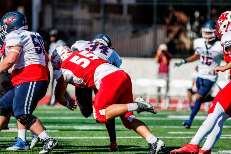 a group of football players on a field