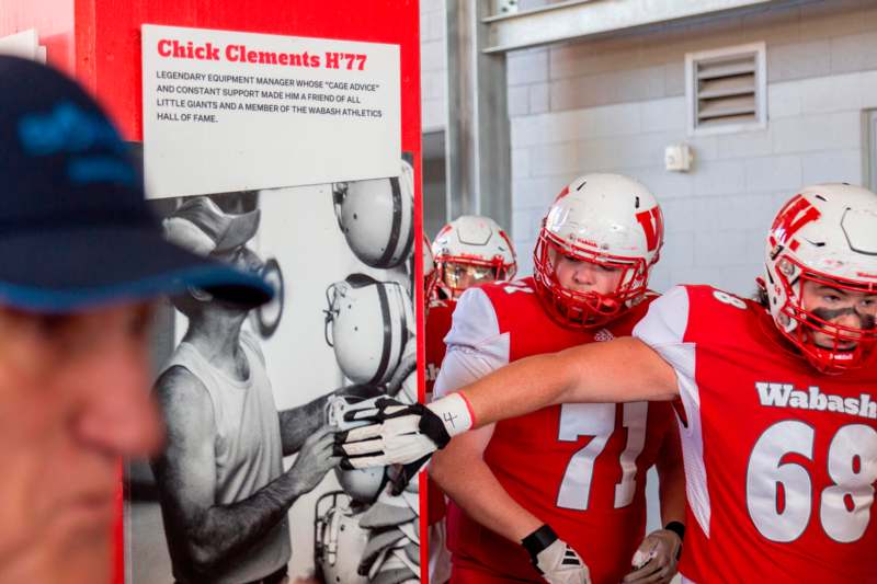 a group of football players in a room