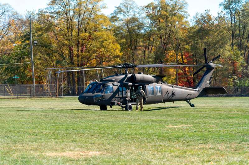 a helicopter on a grass field