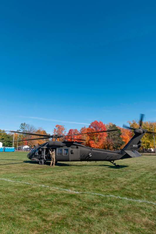 a helicopter on a grass field