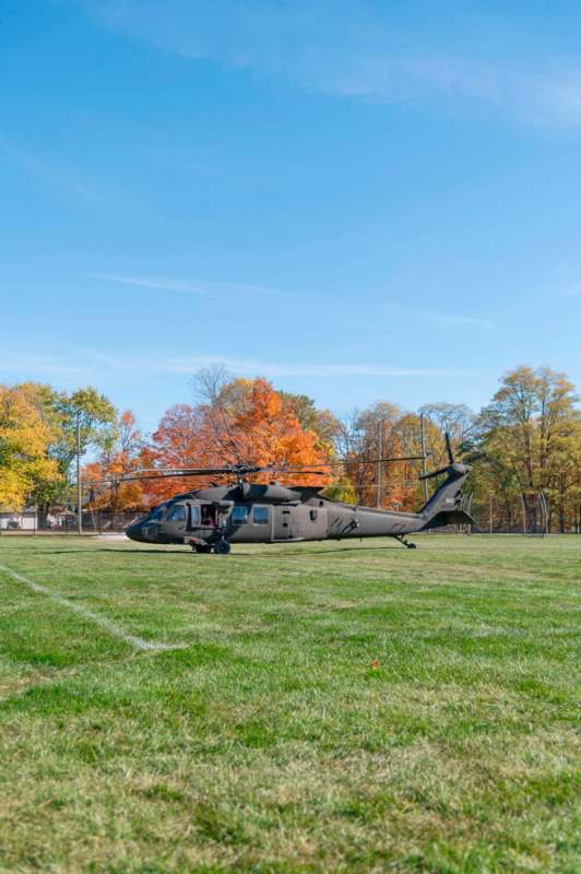 a helicopter on a grass field