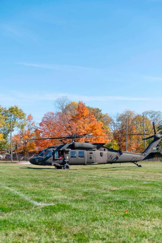 a helicopter on a grass field