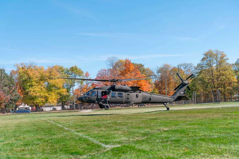 a helicopter on a grass field