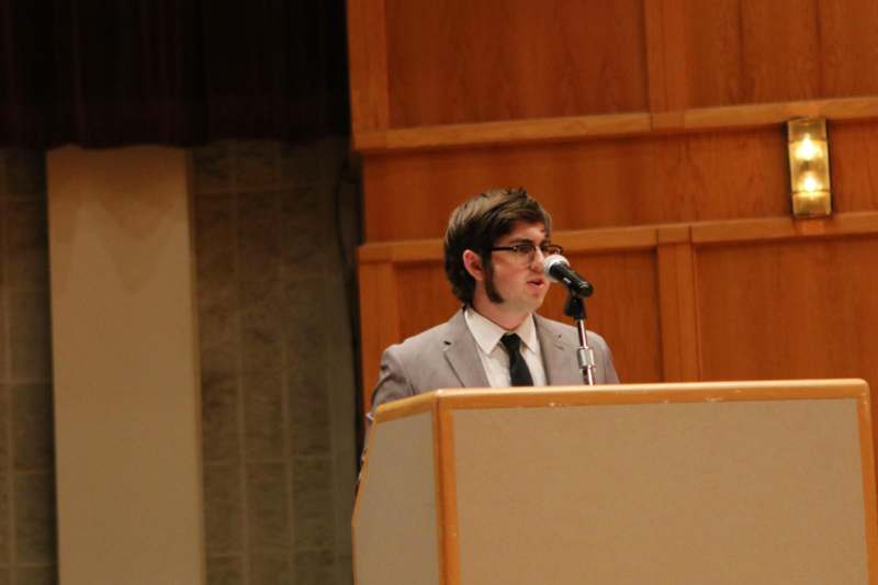 a man speaking into a microphone