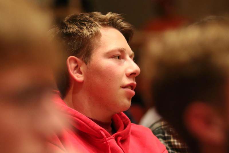 a man in a red hoodie