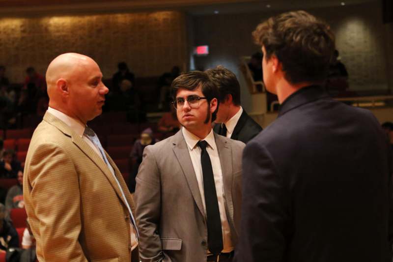 a group of men in suits