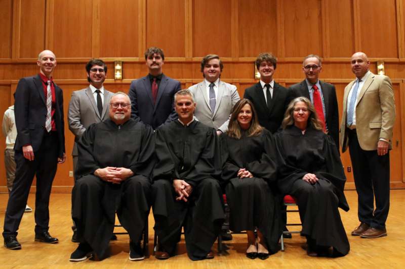 a group of people posing for a photo