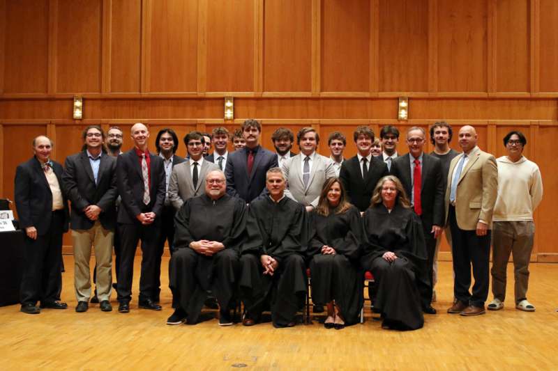 a group of people posing for a photo