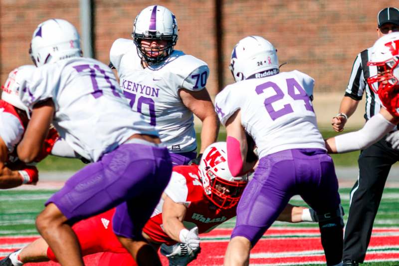 a group of football players playing