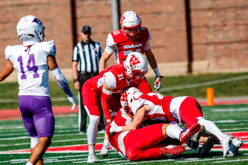 a group of football players on a field