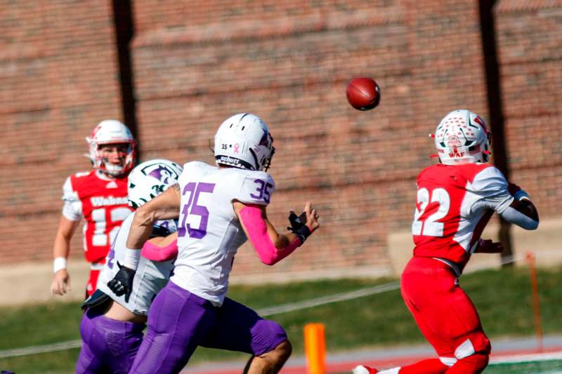 a group of football players in a game