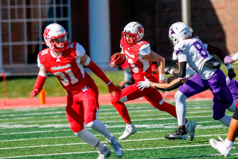 a group of football players on a field