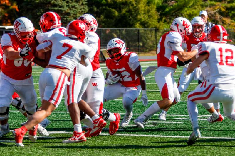 a group of football players on a field