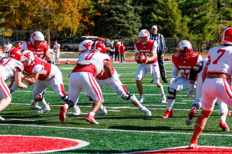 a group of football players on a field