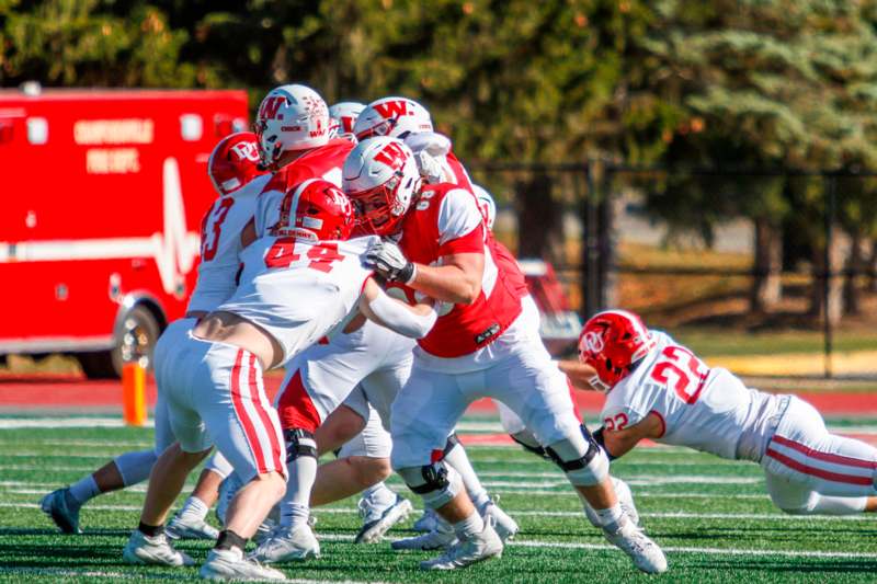 a group of football players on a field