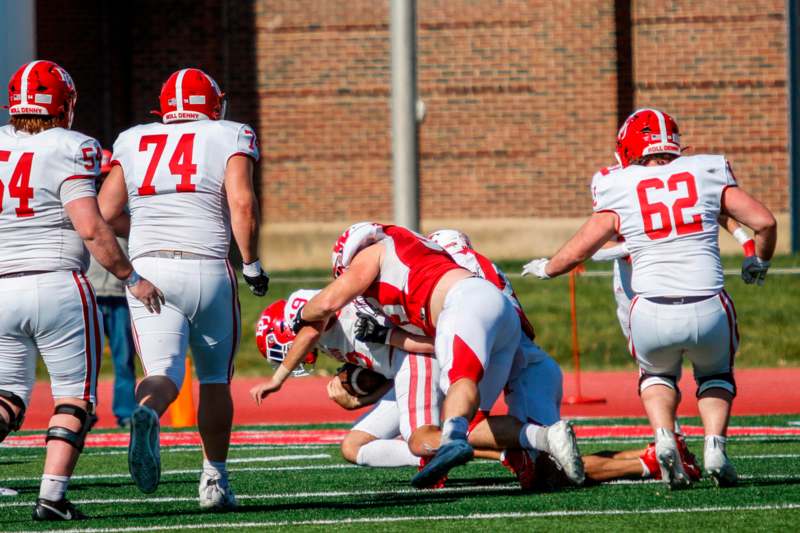 a group of football players on a field