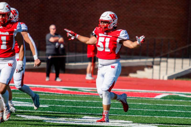 a football player running on a field