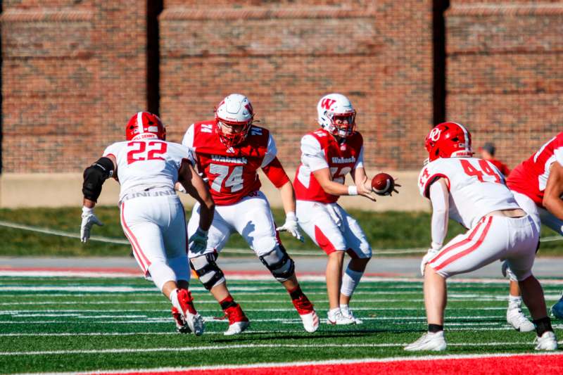 a group of football players on a field