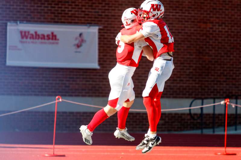 two football players celebrating