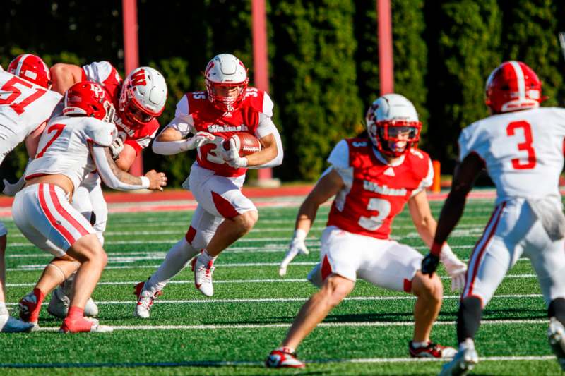 a group of football players on a field