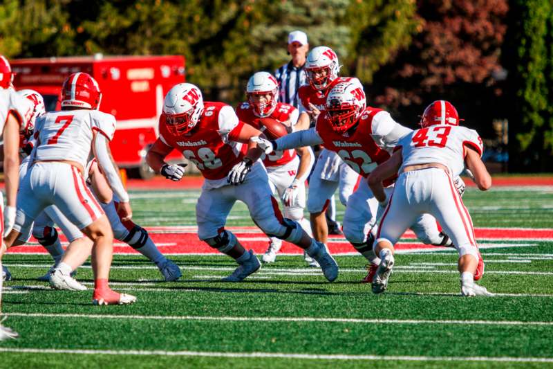 a group of football players on a field