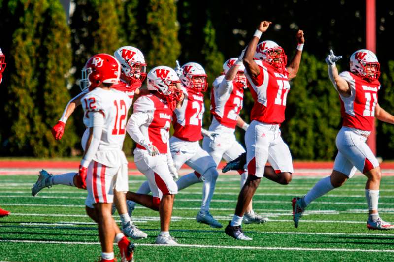 a group of football players on a field