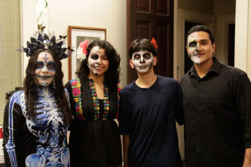 a group of people wearing face paint