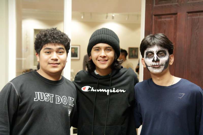 a group of boys with face paint