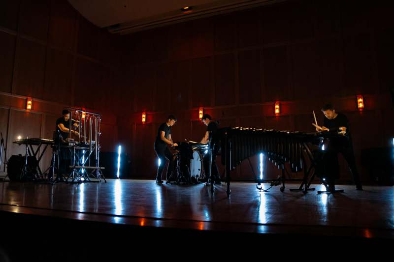 a group of people playing instruments