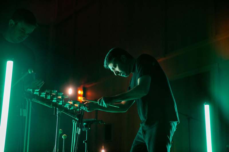 a man playing a drum set