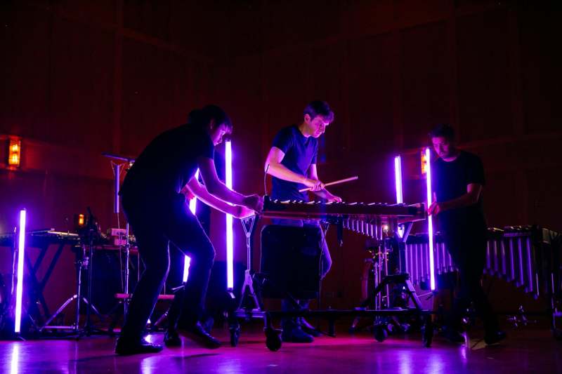 a group of people playing instruments