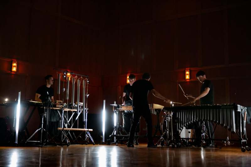 a group of men playing drums