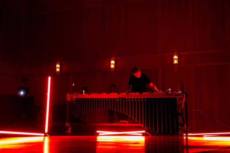 a man playing a xylophone