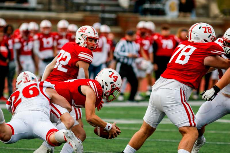 a group of football players on a field